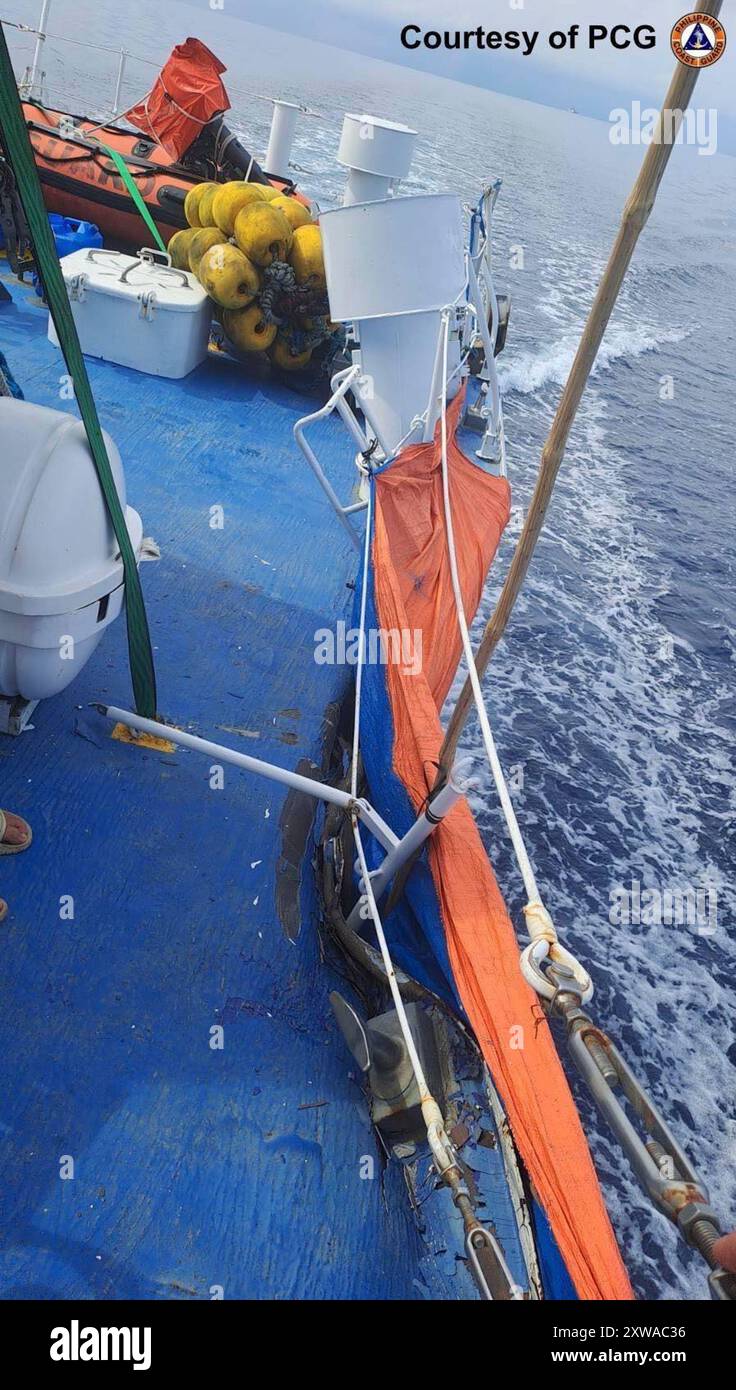 This photo provided by the Philippine Coast Guard, shows damage on ...