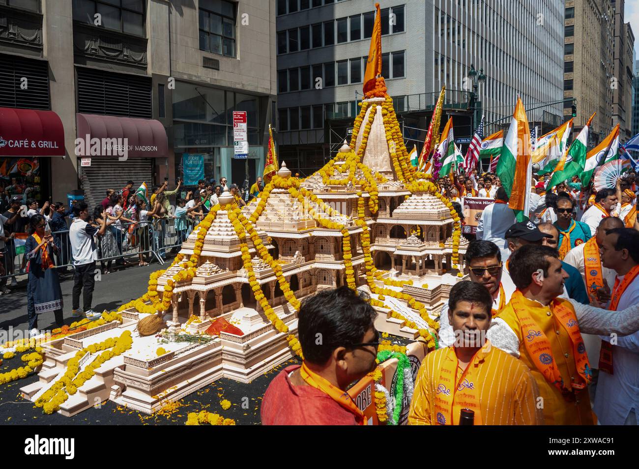 New York, United States. 18th Aug, 2024. Participants march along the Ram Mandir temple float that celebrates a Hindu temple built over a razed mosque in India and is being criticized as anti-Muslim at the 42nd India Day Parade on Madison Avenue. The parade celebrates India's culture, folklore, and traditions. (Photo by Ron Adar/SOPA Images/Sipa USA) Credit: Sipa USA/Alamy Live News Stock Photo