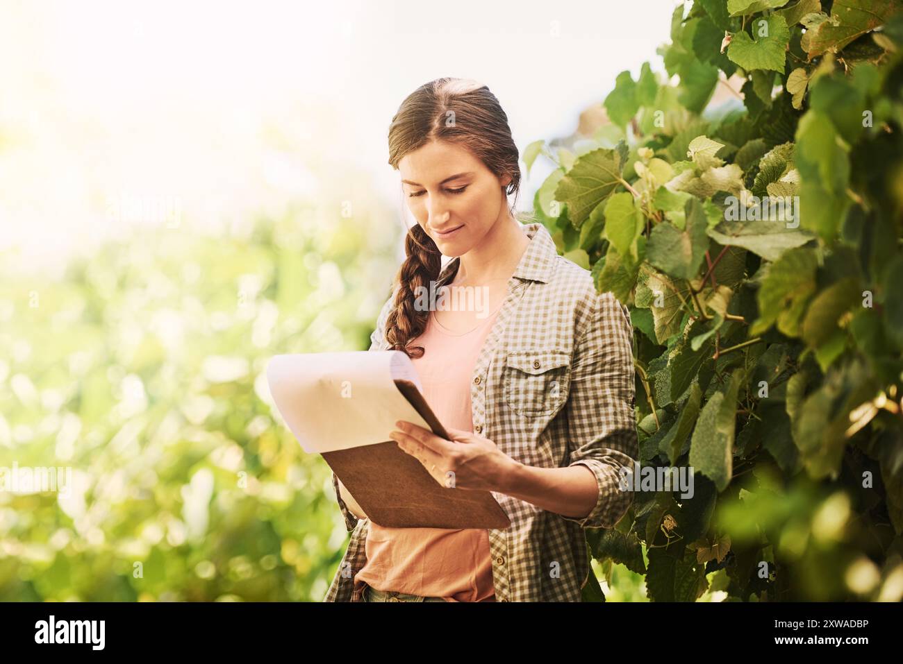 Farming writing checklist woman hi-res stock photography and images - Alamy