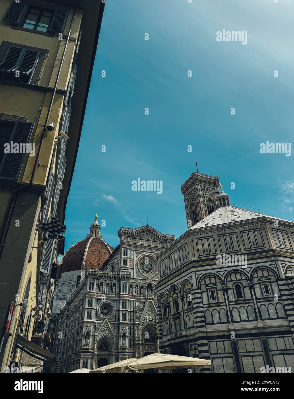 dome on top and a clock tower in florence Stock Photo - Alamy