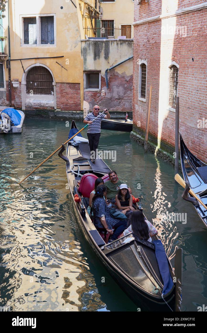 Venice Gondola Ride Through Historic Canals Stock Photo - Alamy