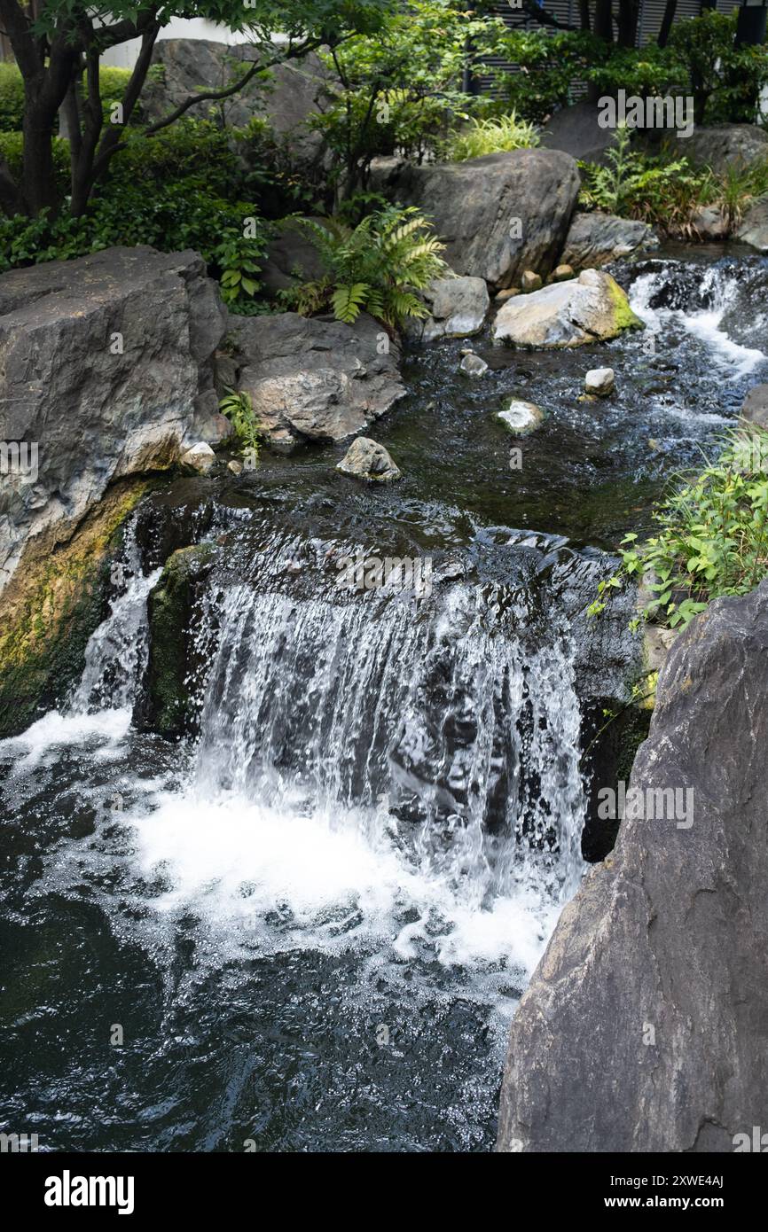 Stream in the grounds of Sensoji Shrine in Asakusa Tokyo Japan Stock Photo