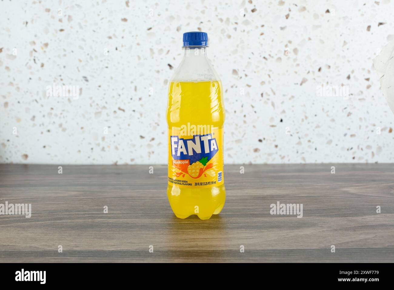 Los Angeles, California, United States - 04-14-2024: A view of a bottle of Fanta pineapple, in a menu item setting. Stock Photo