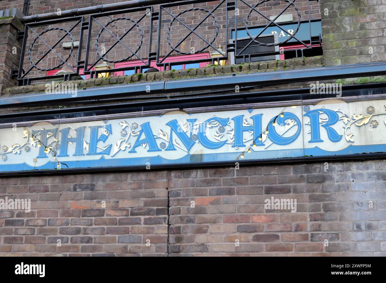 Sign of The Anchor, a pub in the London Borough of Southwark, Bankside locality on the south bank of the River Thames, now owned by Greene King Stock Photo