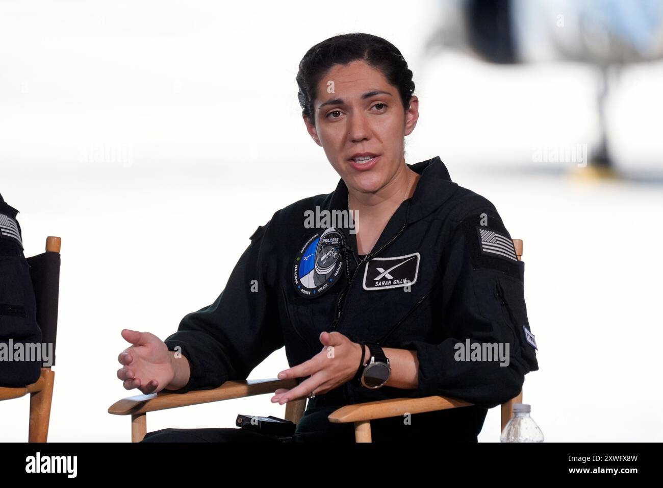 Mission specialist Sarah Gillis speaks at a news conference after ...