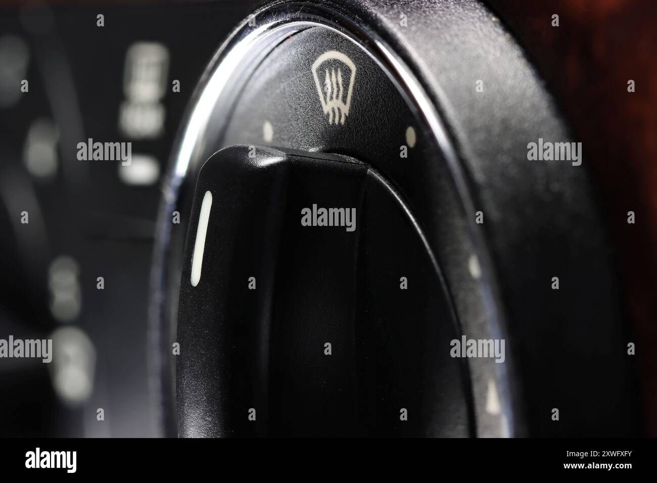 air flow direction switch inside a used car Stock Photo