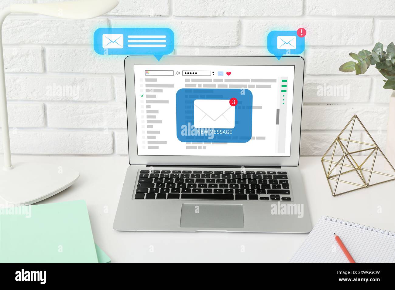 Received email messages on screen of laptop at workplace Stock Photo ...