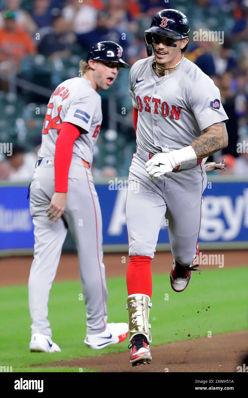 Boston Red Sox third base coach Kyle Hudson, left