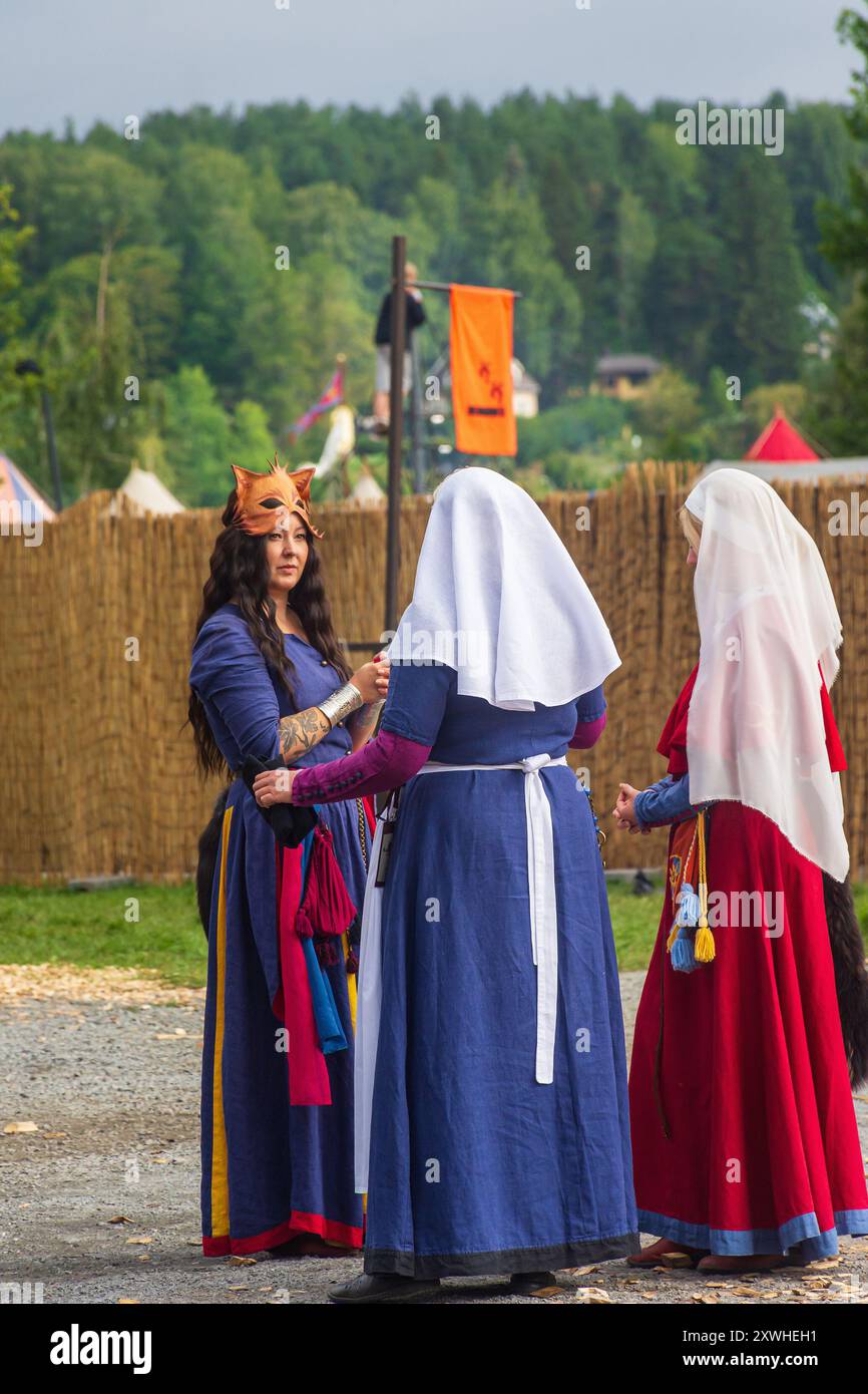 Three women dressed in medieval costumes at Häme Medieval Festival in ...