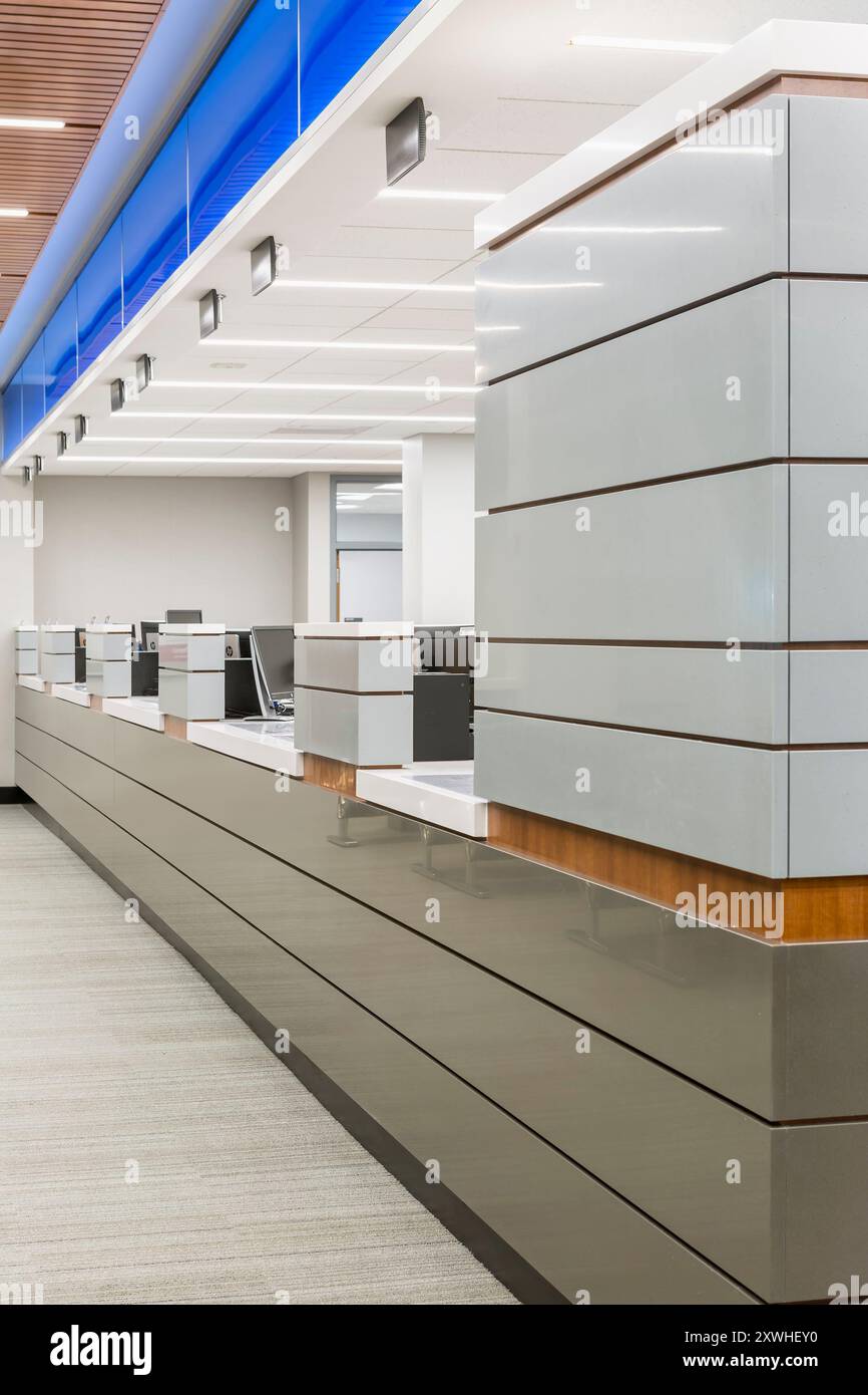 Interior of new county service center showing long counter Stock Photo ...