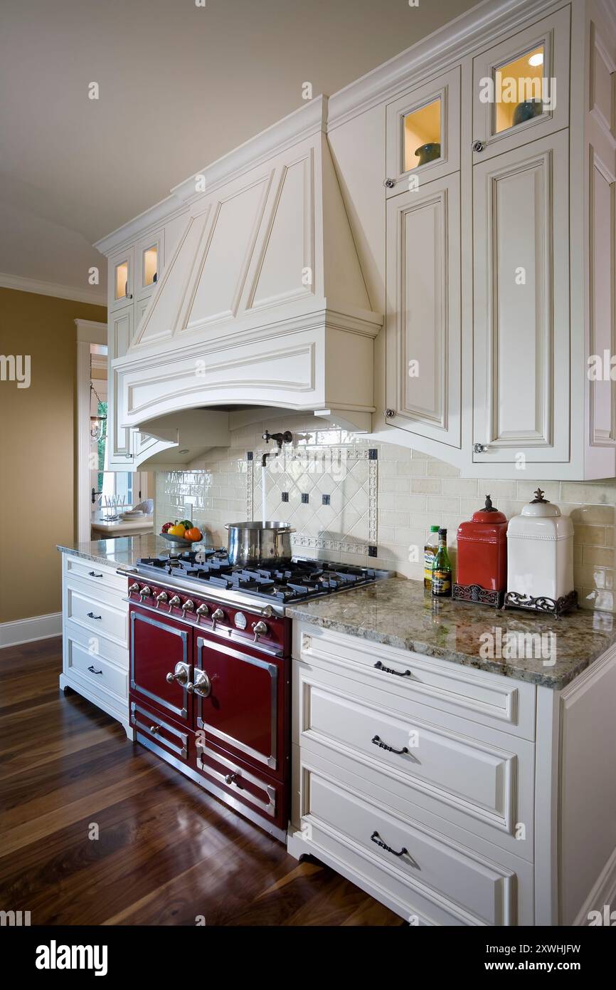 Red La Cornue stove in white french country style kitchen Stock Photo -  Alamy, image size:866x1390