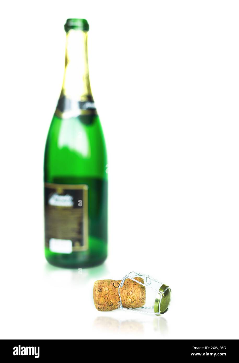 empty champagne bottle with its cork, isolated on white background Stock Photo