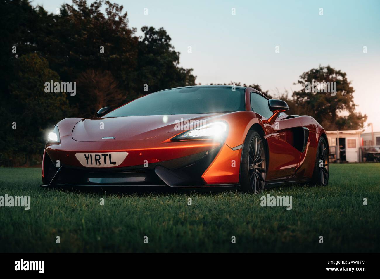 McLaren 570 GT - Volcano Orange Stock Photo - Alamy