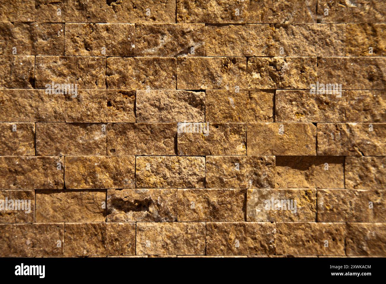 Rectangular cut out beige organic marble wall texture background can be, tile seamless lined up Stock Photo
