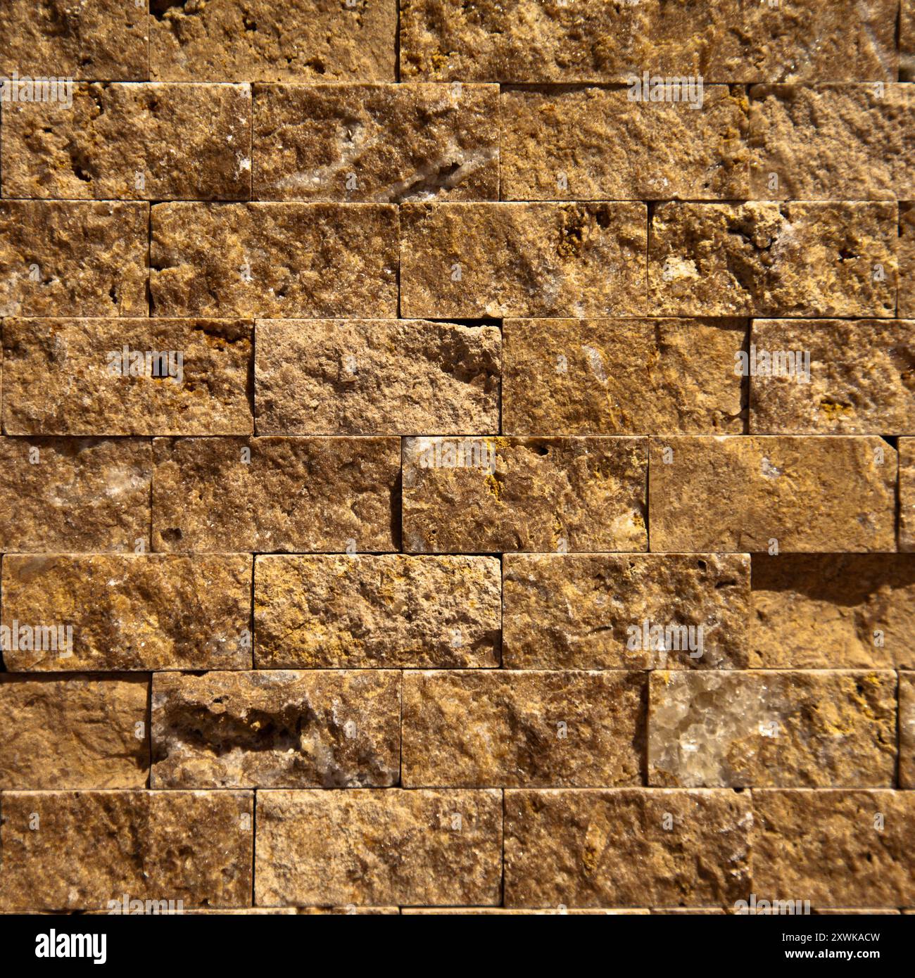 Rectangular cut out beige organic marble wall texture background can be, tile seamless lined up Stock Photo