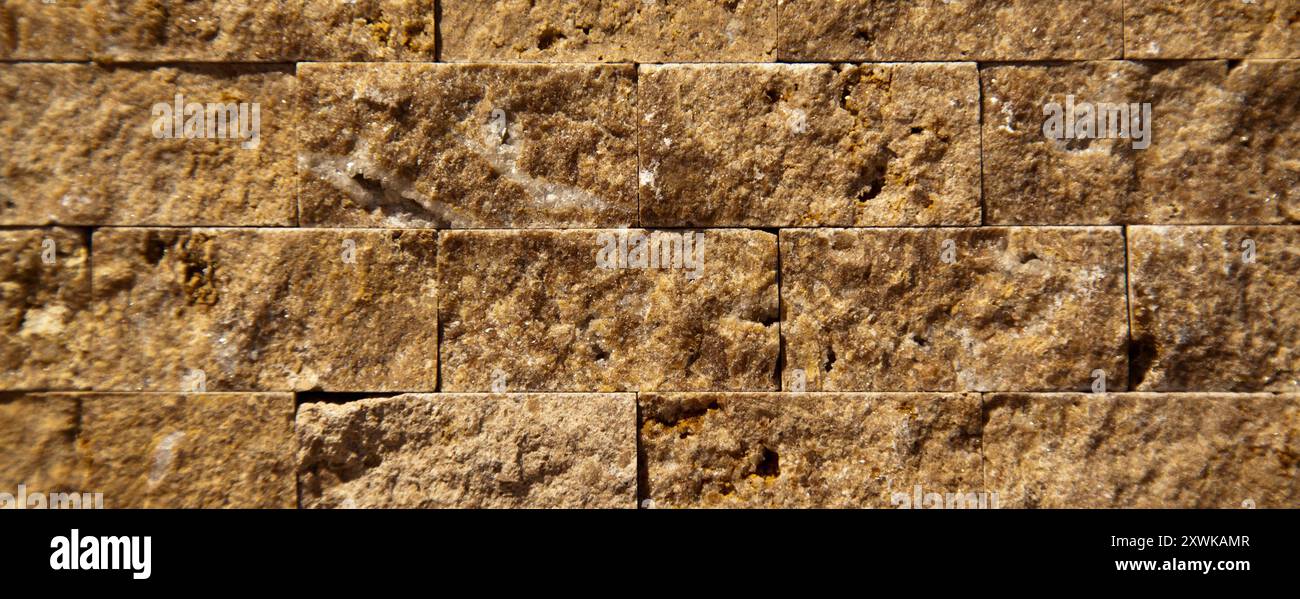 Rectangular cut out beige organic marble wall texture background can be, tile seamless lined up Stock Photo