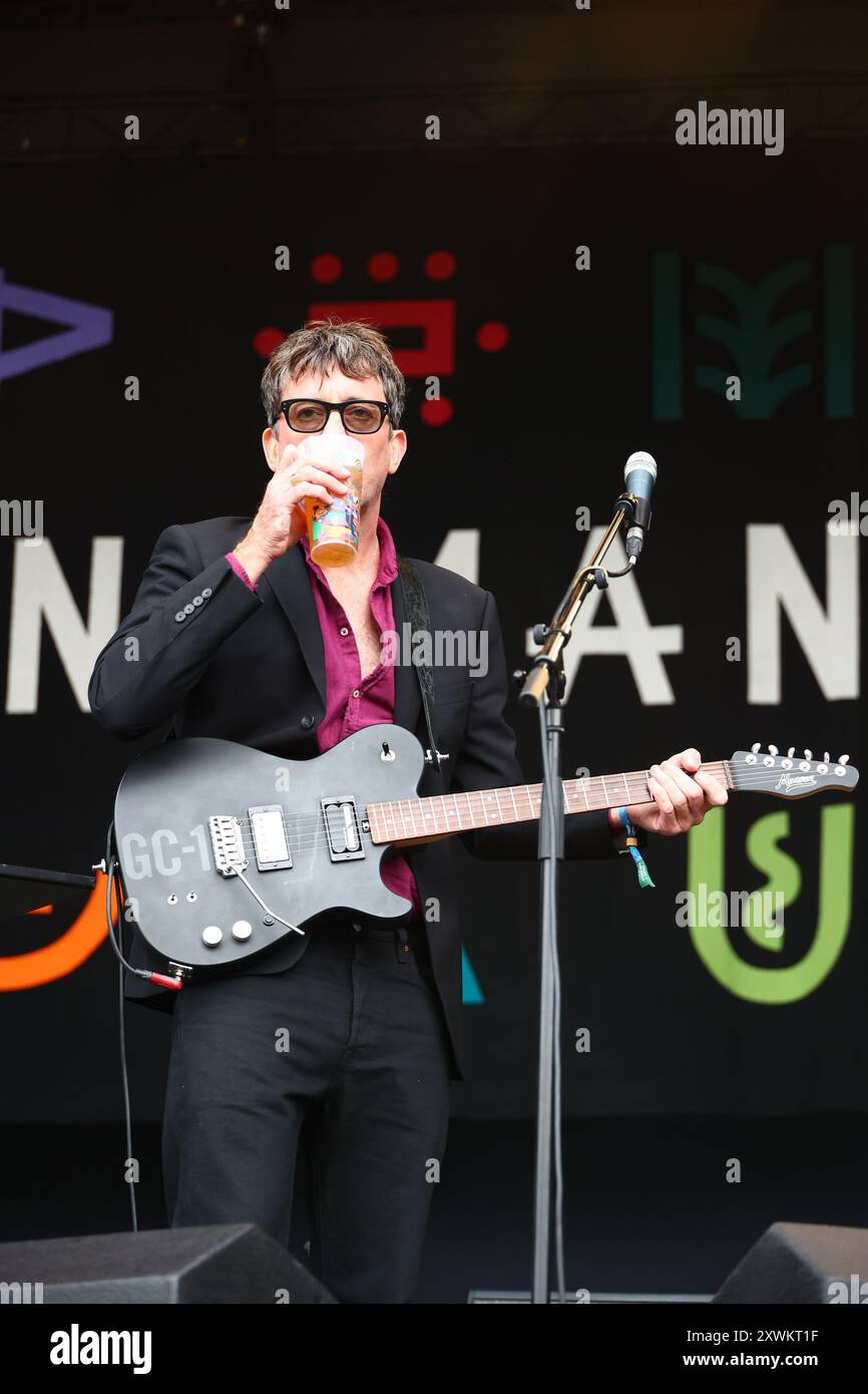 Green Man Festival, Brecon Beacons, Wales, UK. 17th Aug, 2024. The Waeve at Green Man Festival. Pictured: Singer, vocalist, guitarist Graham Coxon having a beer. Credit: nidpor/EMPICS/17�Թ����� Live News Stock Photo