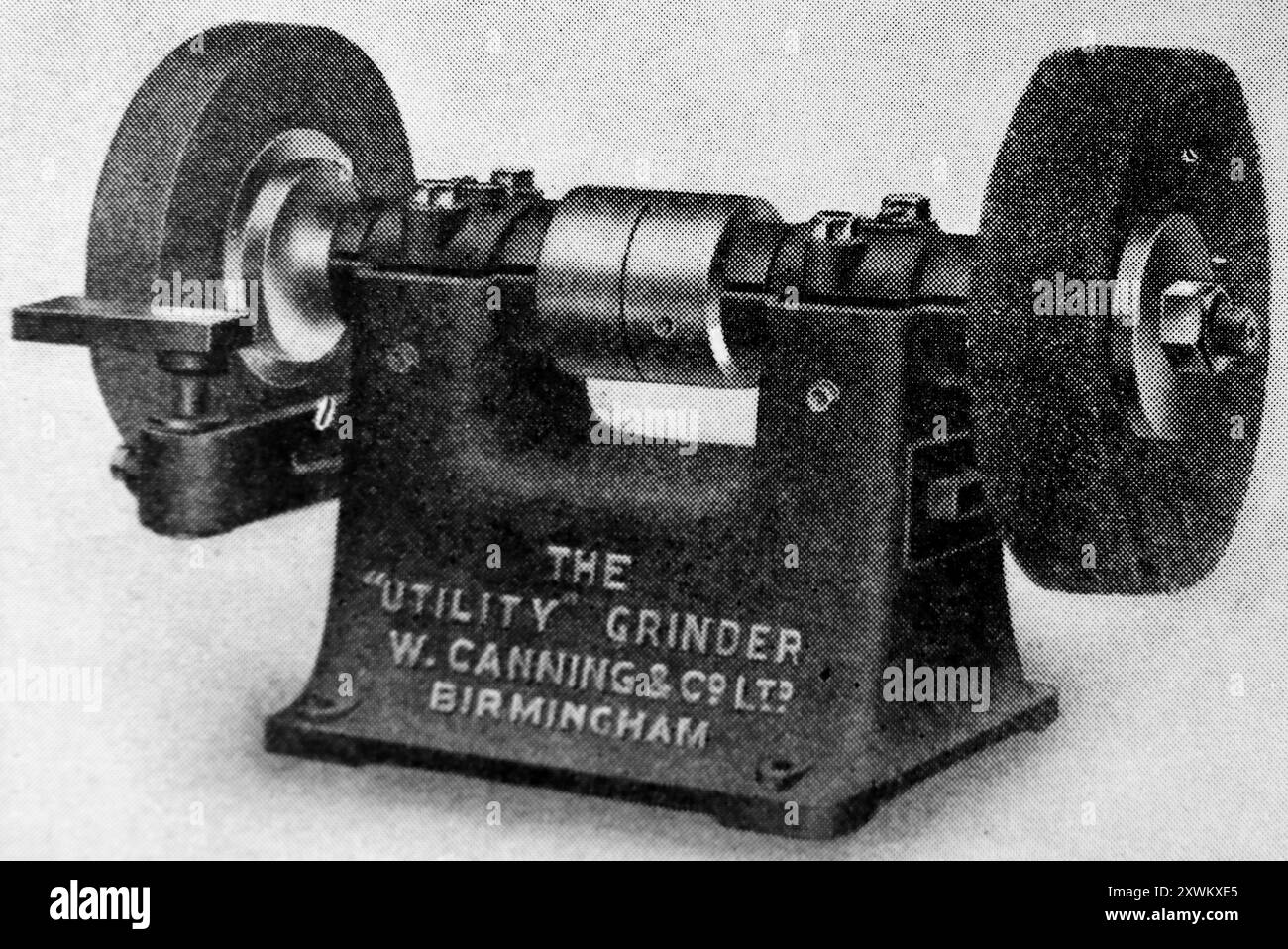 A Canning (Birmingham, England) utility grinder and polisher for bench use. This photograph is from a large selection of mainly unattributed engineering illustrations and photos which were originally published in 1936. The sizes and quality of the originals vary quite widely. Stock Photo