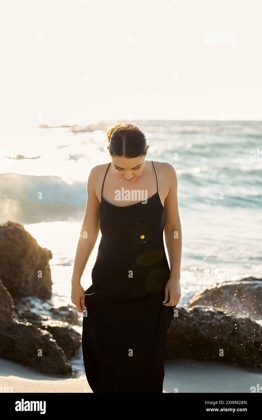 Woman walks along tropical hi-res stock photography and images - Alamy