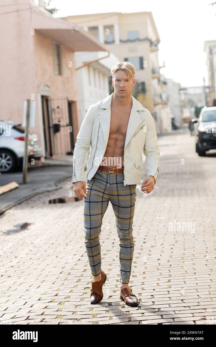 Handsome blonde man poses hi-res stock photography and images - Alamy