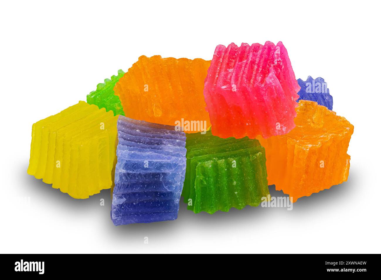 Crispy jelly. Closeup view pile of colorful cube shape crispy jelly isolated on white background with clipping path. Stock Photo