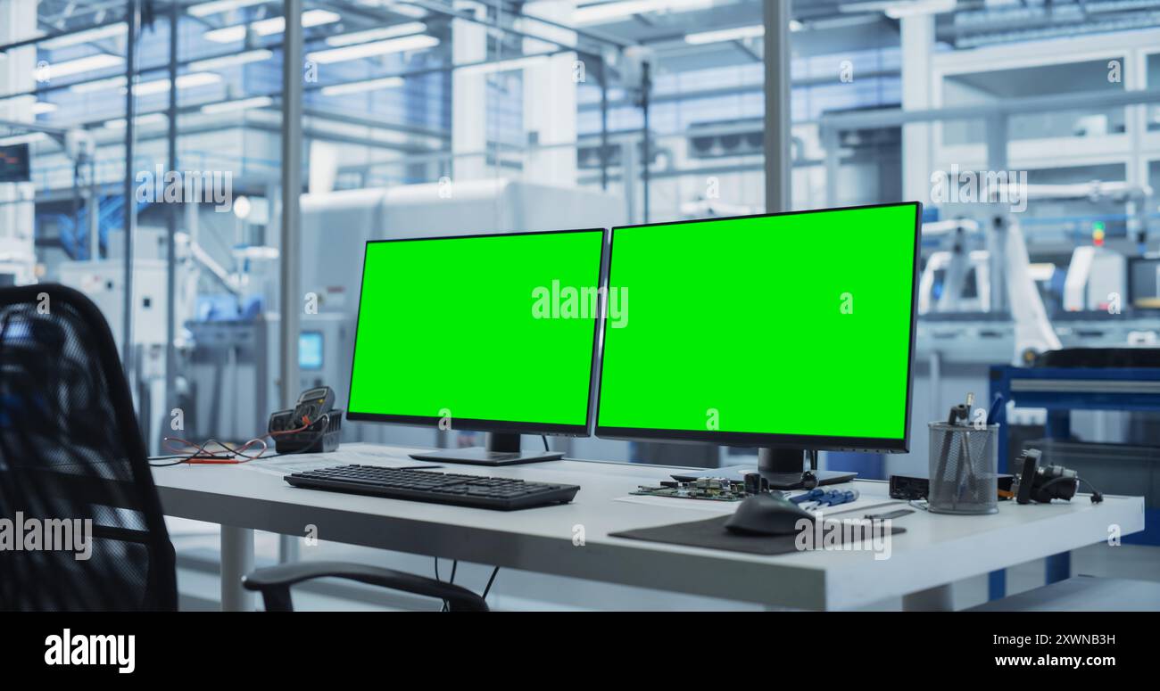 Computers green screen in industry hi-res stock photography and images ...