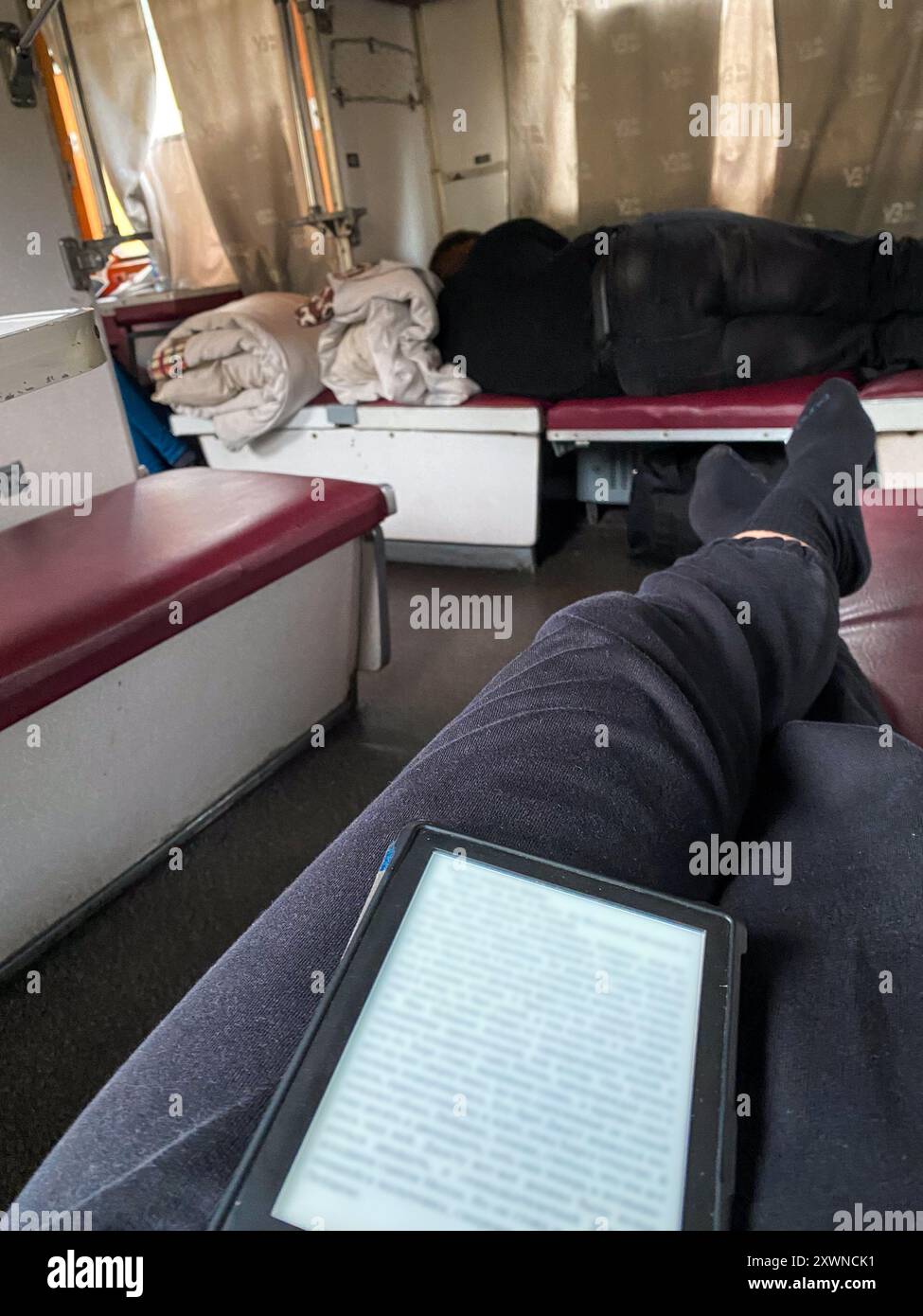 Cozy Train Compartment with Scenic View Stock Photo - Alamy