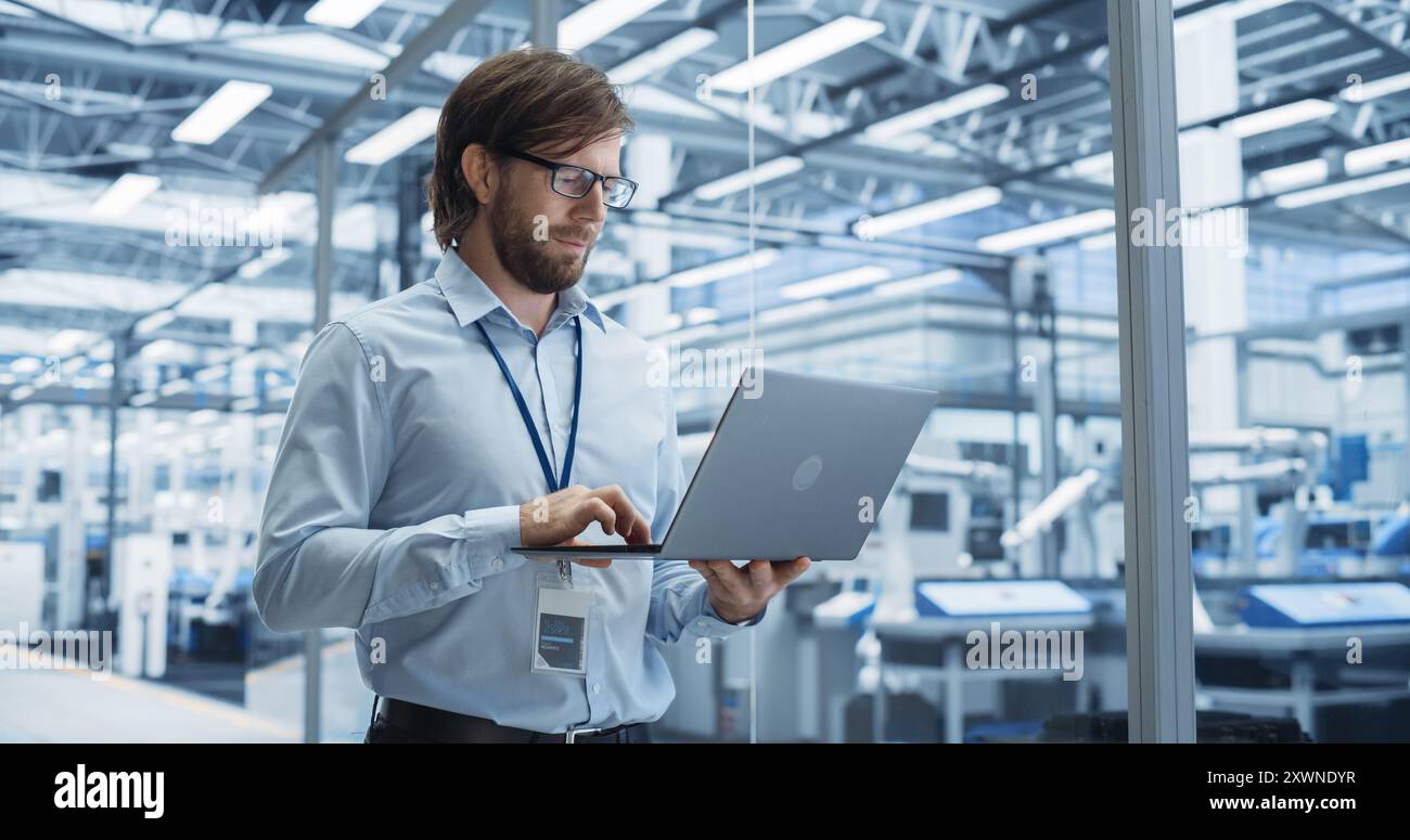 Male engineer laptop looking around hi-res stock photography and images ...