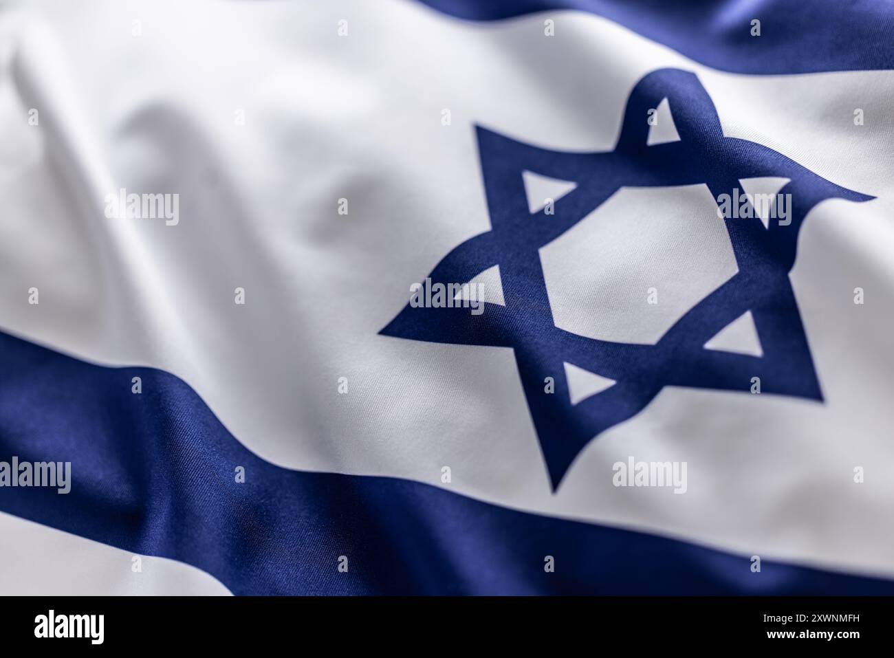 Israeli flag blowing in the wind - Close up Stock Photo - Alamy