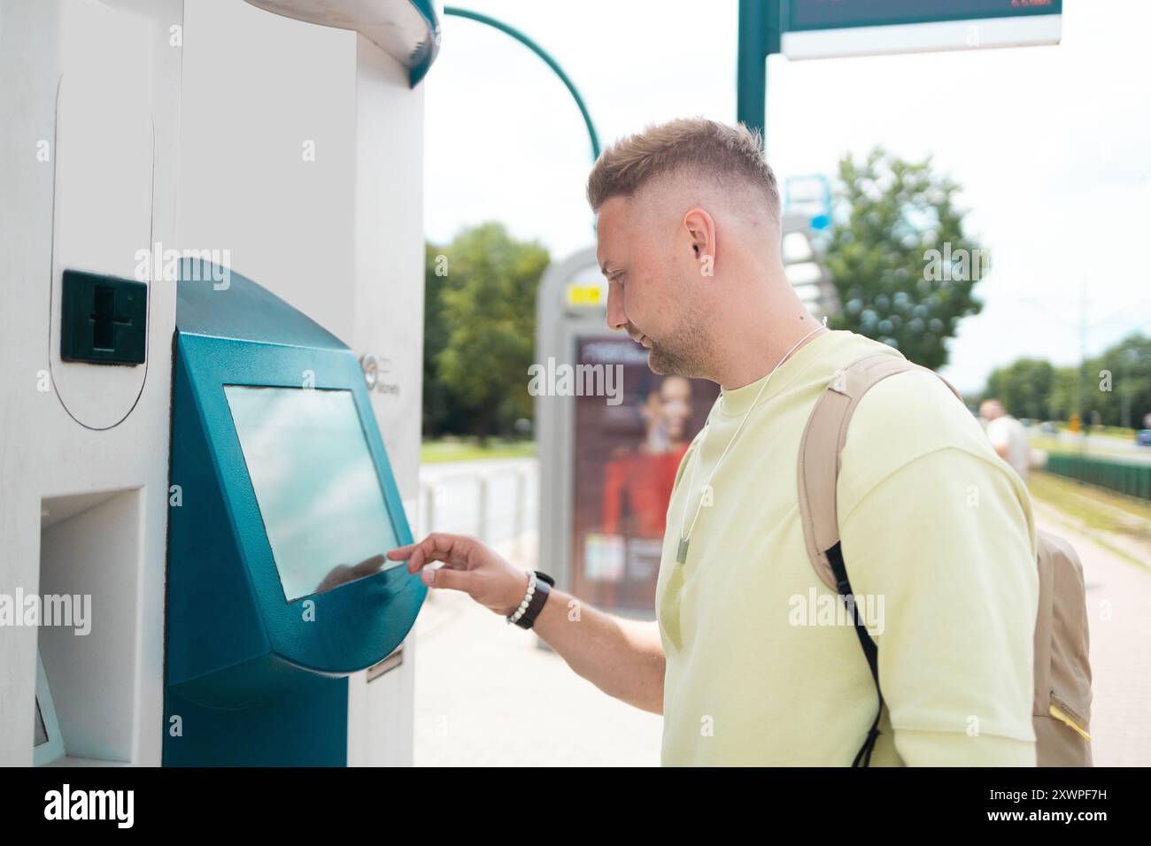 Man buys tram ticket hi-res stock photography and images - Alamy