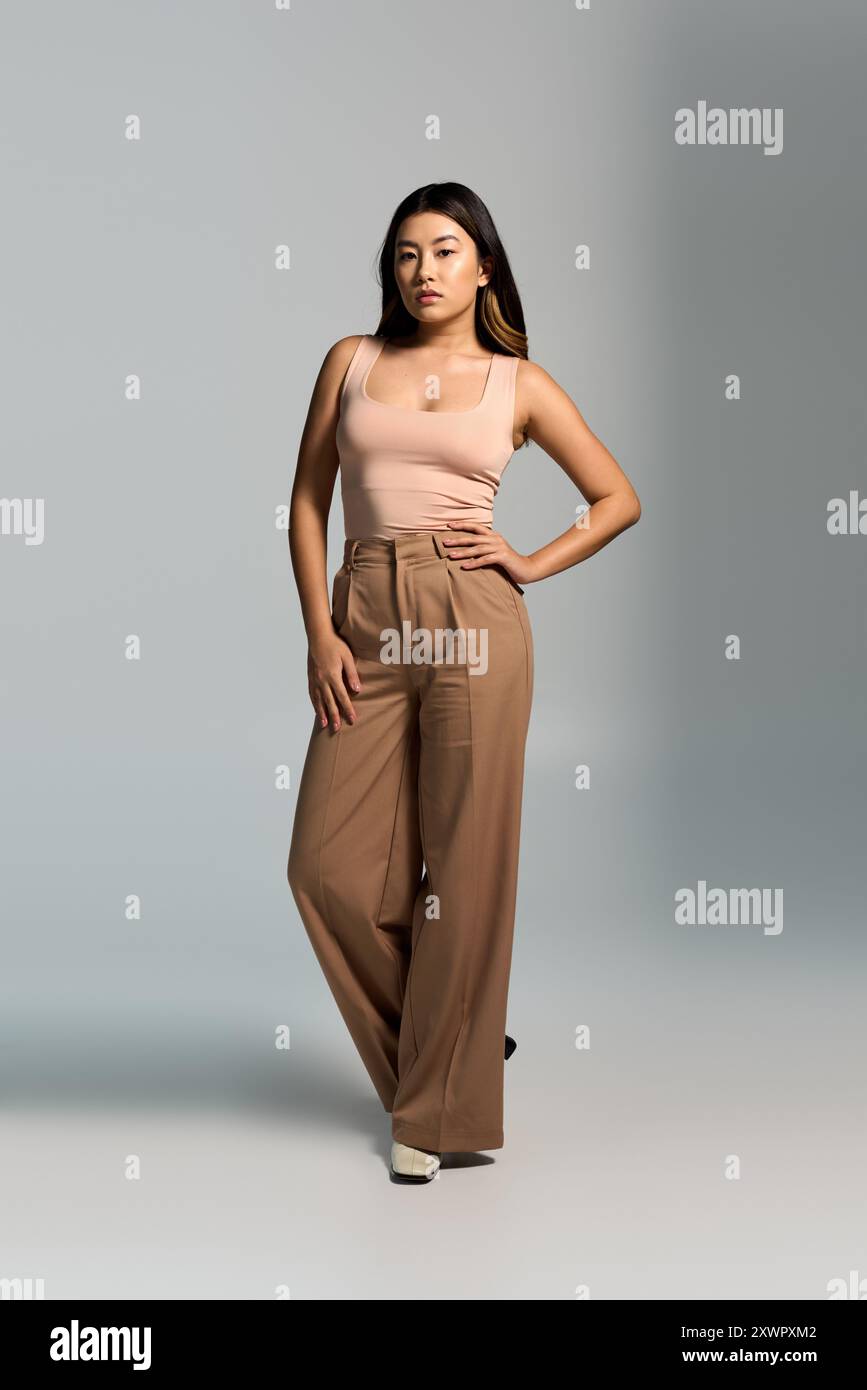 Full body asian woman standing hi-res stock photography and images - Alamy