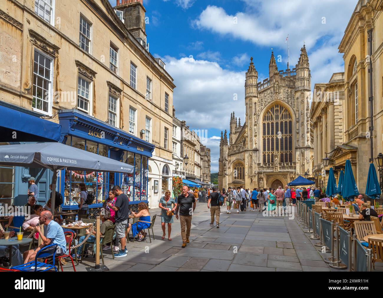 View down Abbey Churchyard towards Bath Abbey with the Roman Baths to the right, Bath, Somerset, England, UK Stock Photo