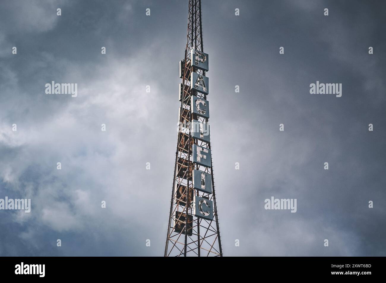 Tower of the Historic Hollywood Pacific Theater against a cloudy sky, Los Angeles, California, USA Stock Photo