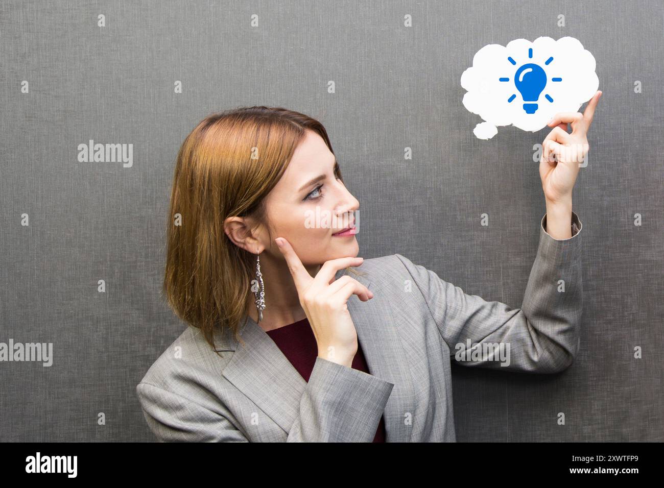 businesswoman holding speech bubble. light bulb and creativity idea Stock Photo