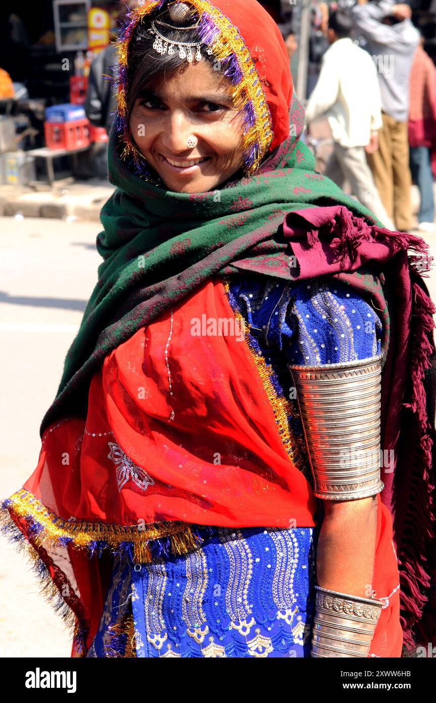 Woman wearing silver dress hi-res stock photography and images - Alamy