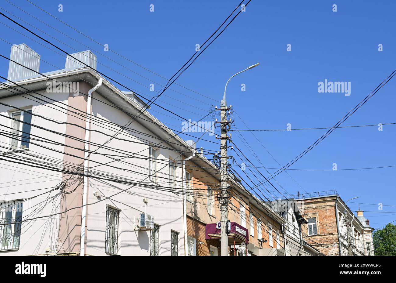 electrical wires on a pole. cityscape Stock Photo - Alamy