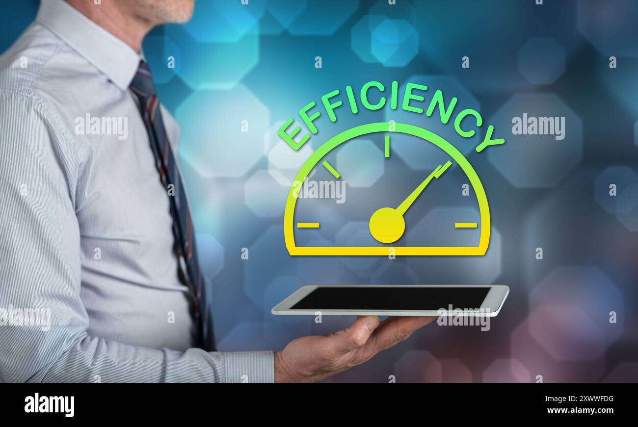 Efficiency concept above a tablet held by a man Stock Photo
