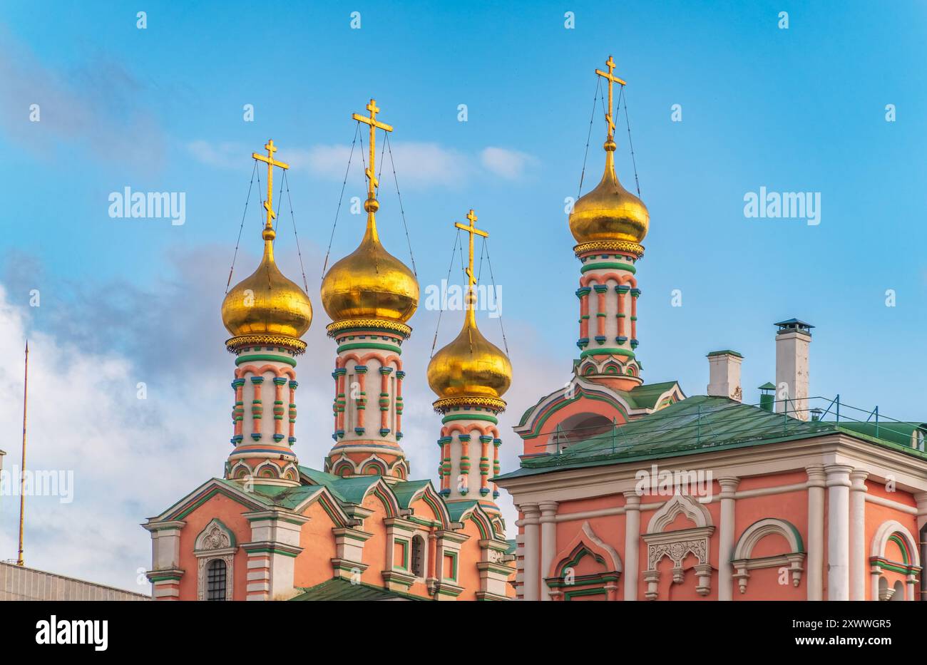 Golden domes of the Orthodox Church with crosses on blue sky background ...