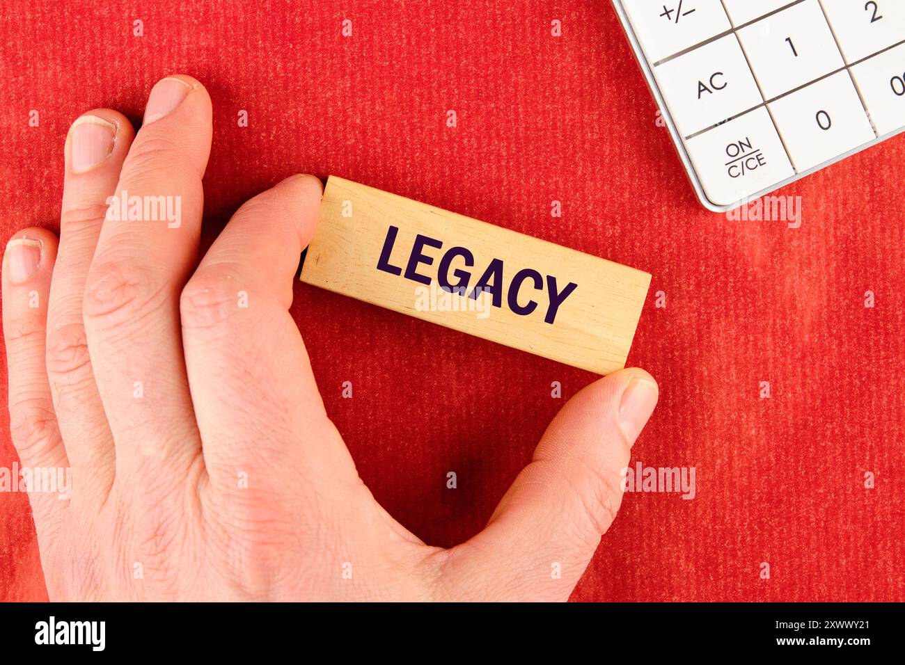 Legacy written lettering on wooden blocks on a red background Stock ...
