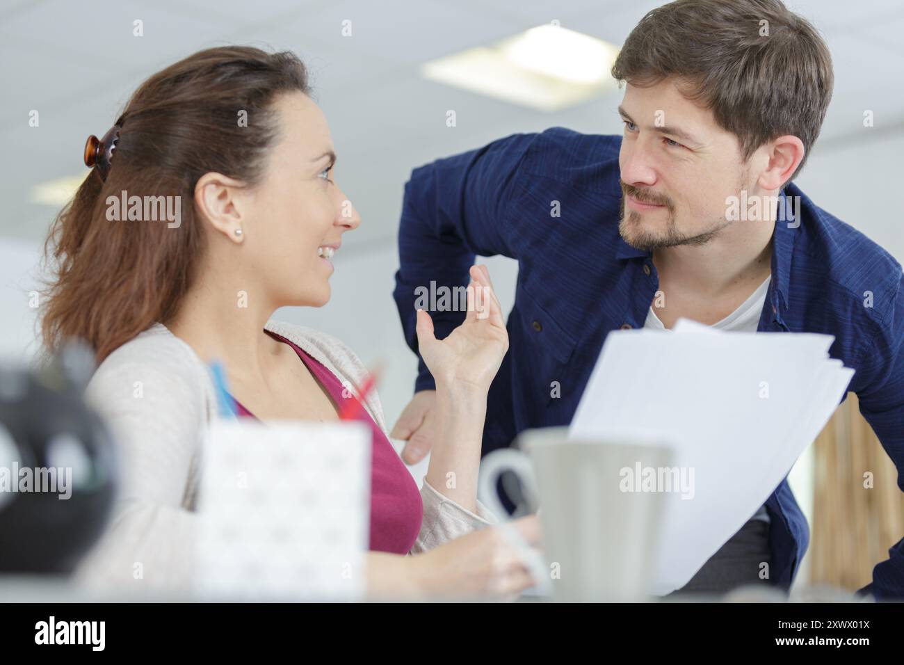 man and woman office worker in office Stock Photo