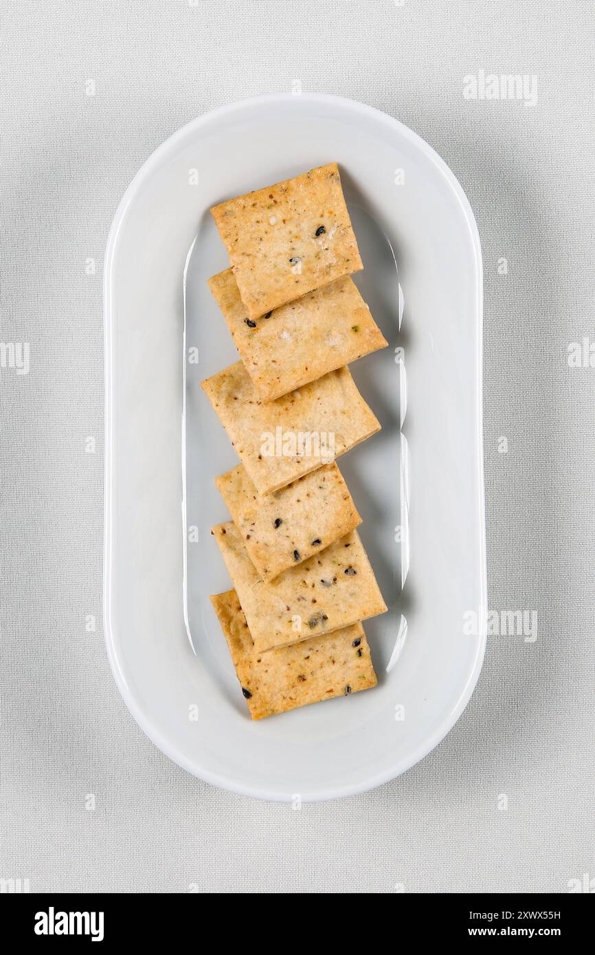 Homemade vegetable crackers or biscuits isolated on white background ...