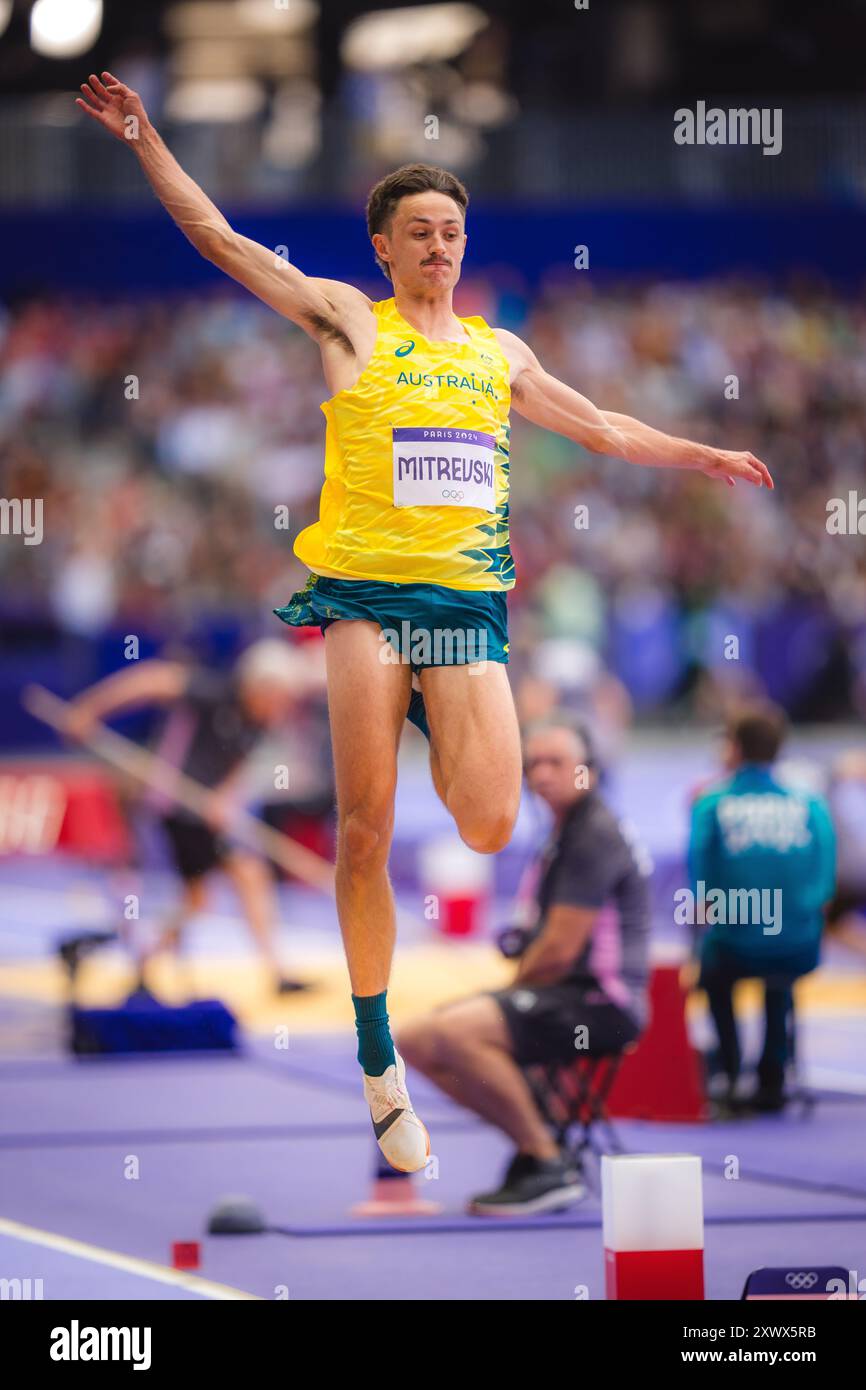 Chris Mitrevski participating in the long jump at the Paris 2024