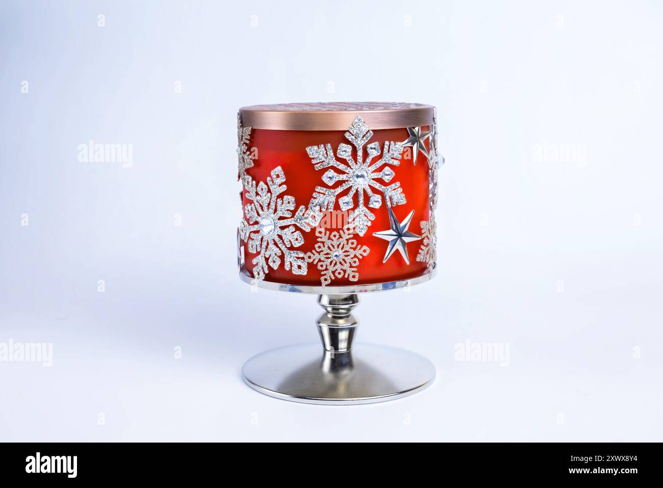 beautiful decorated snowflakes candlestick on a white background. Stock Photo
