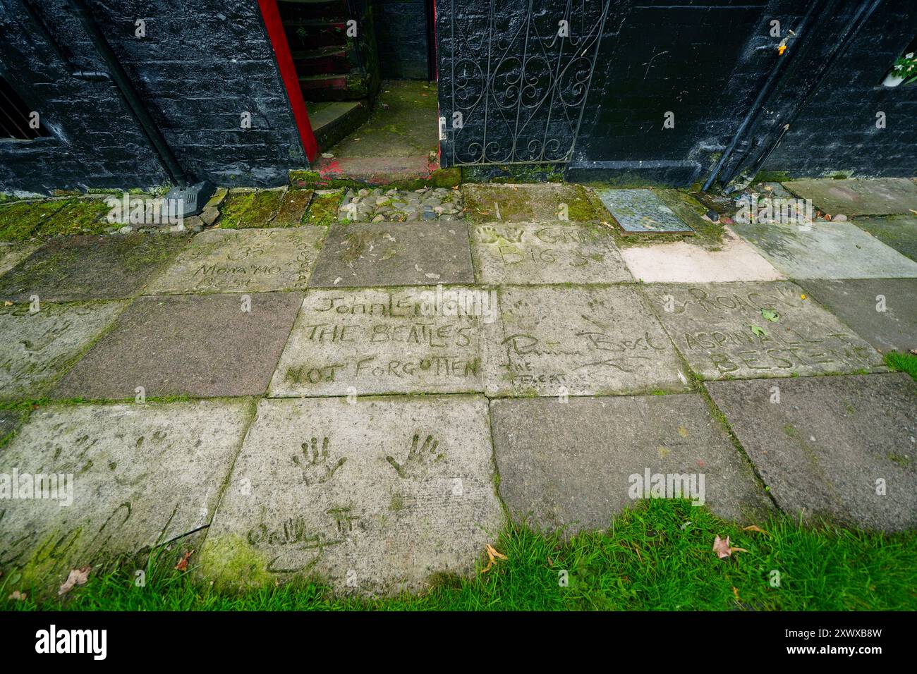 A Beatles-themed footpath in the back garden of the Casbah Airbnb, beside the original entrance to the Casbah Club. The property at 8 Hayman's Green in the Derby area of Liverpool, the location of the Casbah Club, where the Beatles started their career, has been launched as an Airbnb. Original Beatles drummer Pete Best's mother Mona ran the Casbah in the coal cellar of their home in West Derby, Liverpool, from 1959 to 1962, with local teenagers The Quarrymen playing the opening night in August 1959. Members of The Quarrymen would go on to form The Beatles. Picture date: Wednesday August 21, 20 Stock Photo