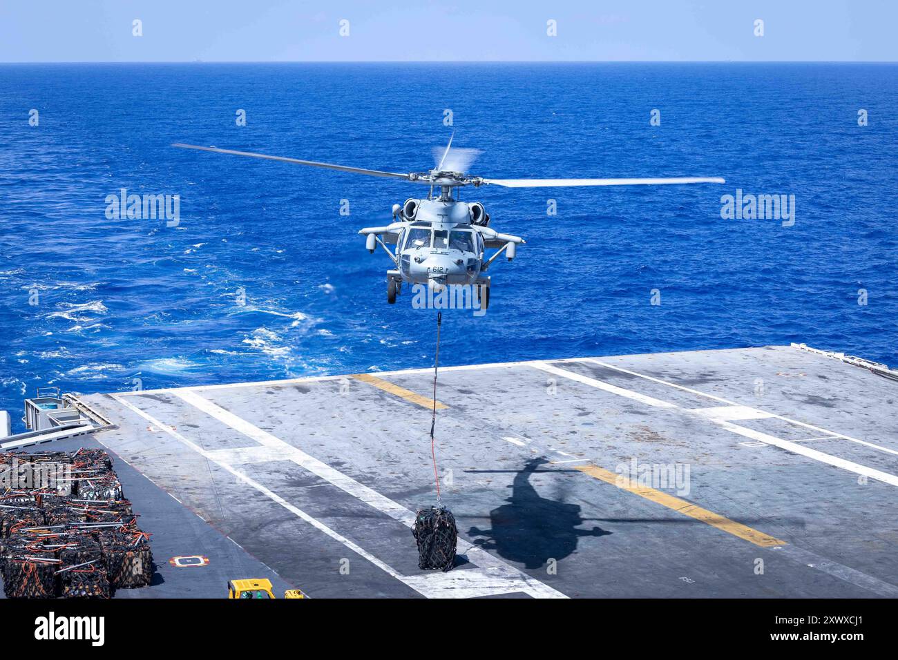 240803-N-KA812-1360 ATLANTIC OCEAN (Aug. 16, 2024) An MH-60S Sea Hawk helicopter, attached to the 'Dragonslayers' of Helicopter Sea Combat Squadron (H Stock Photo