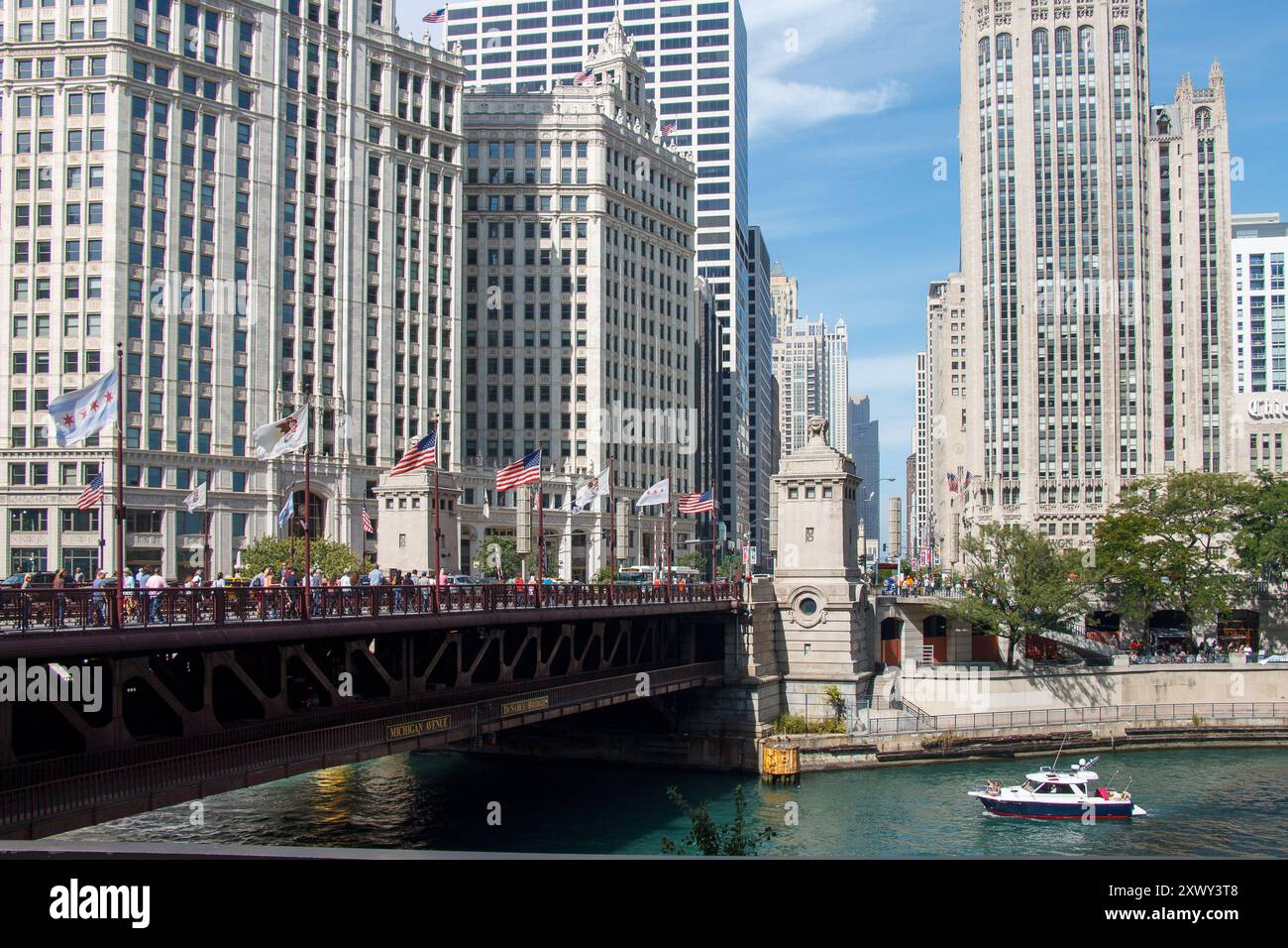 The DuSable bridge over Chicago river, a yacht and the skyline with ...