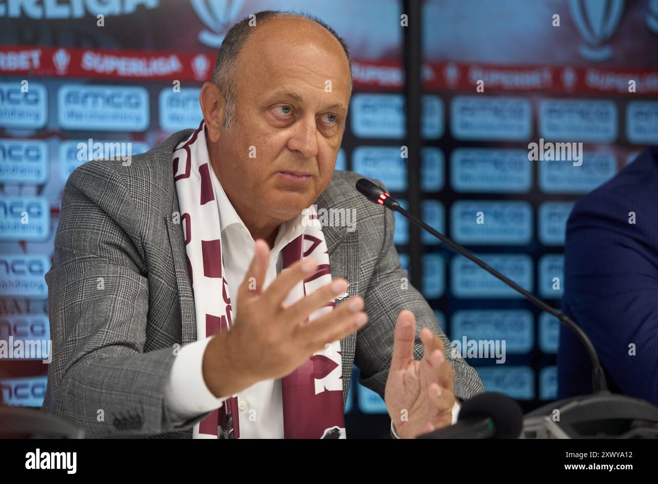 Bucharest, Romania. 21st Aug, 2024: Dan Sucu, the financier of FC Rapid,  speaks during the presentation of Marius Sumudica (not in Picture), the new  coach of the Fotbal Club Rapid Bucharest, in