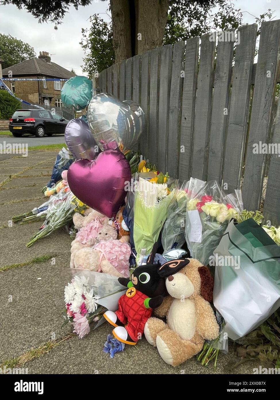 Flowers and tributes near the scene of a fatal house fire in Bradford ...