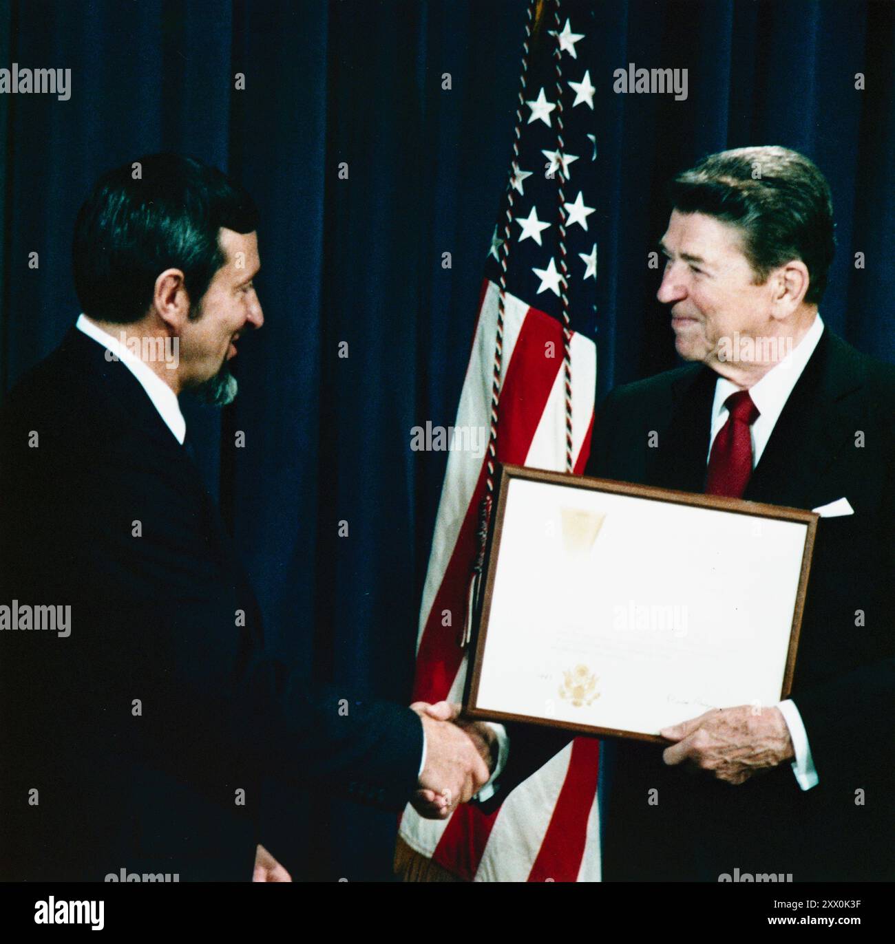 President Ronald Reagan shaking hands with Andrew J. Stofan.  Andrew John Stofan (born January 26, 1935) is an American engineer. He worked for the National Aeronautics and Space Administration (NASA). In the 1960s he played an important role in the development of the Centaur upper stage rocket. In the 1970s he managed the Atlas-Centaur and Titan-Centaur Project Offices, and oversaw the launch of the Pioneer 10 and Pioneer 11 probes to Jupiter and Saturn, the Viking missions to Mars, Helios probes to the Sun, and the Voyager probes to Jupiter and the outer planets. He was director of the Lewis Stock Photo