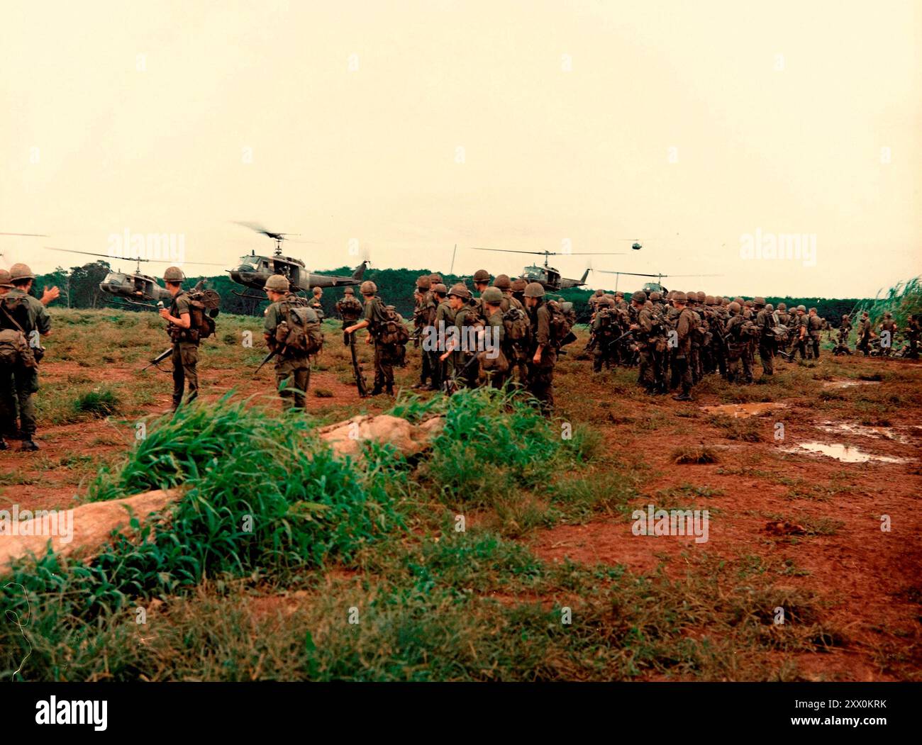 Vietnam War. Soldiers of the 4th Battalion, 50rd Infantry, 173rd Airborne Brigade prepare to be UH1D helicopter air lifted back to the brigade’s base camp.  The battalion just completed a search and destroy mission that was a part of Operation “Toledo”. South Vietnam. September 1, 1966, Stock Photo